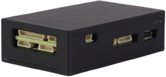 A black rectangular electronic device with multiple exposed ports and connectors on its sides, possibly a single-board computer in a protective case.