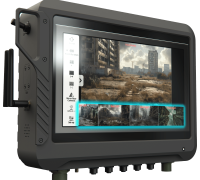 A rugged industrial monitor, one of our Main Products, displays images and video feeds of abandoned, overgrown buildings in a post-apocalyptic urban environment.